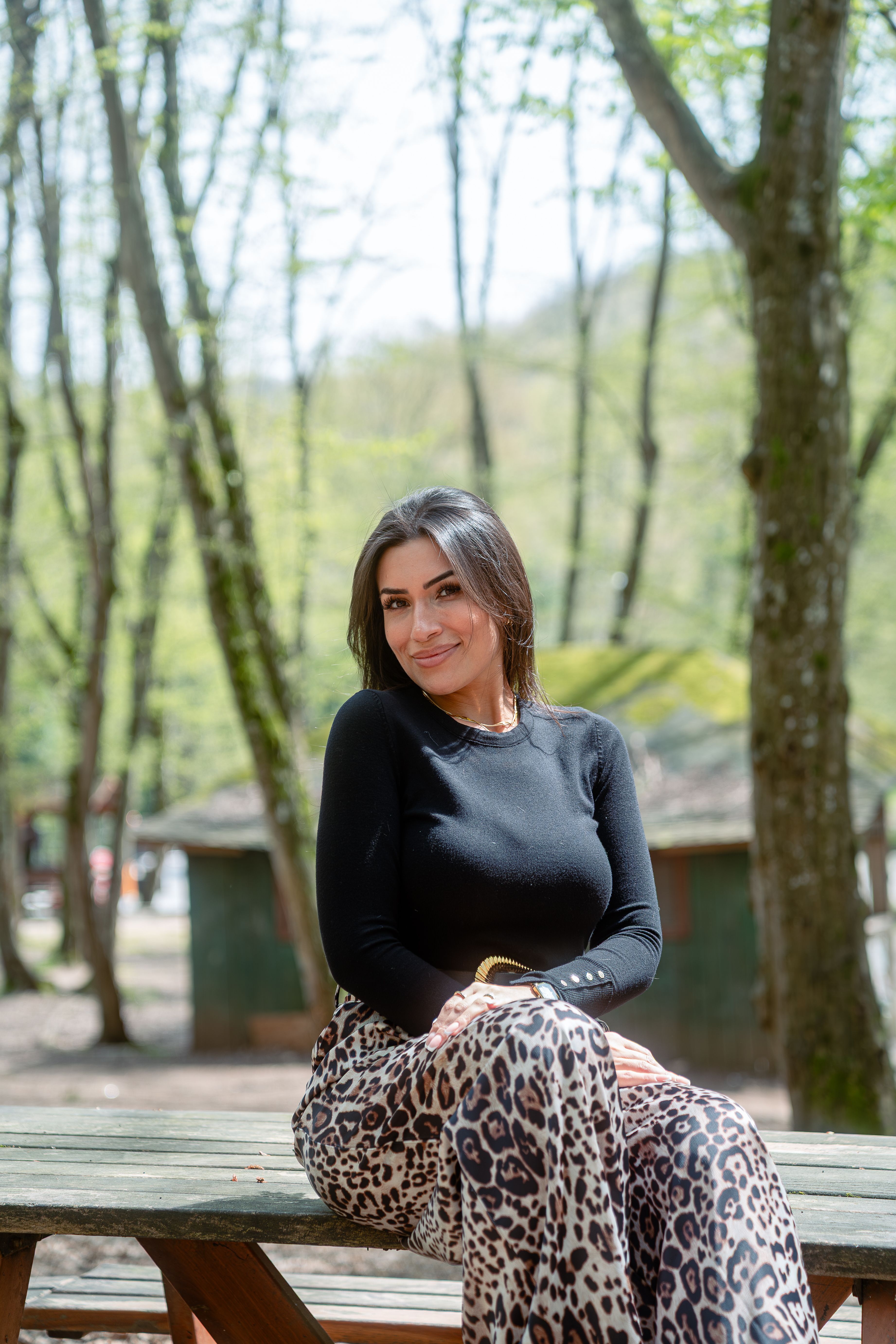 Portrait of Smiling Woman in Park Setting · Free Stock Photo