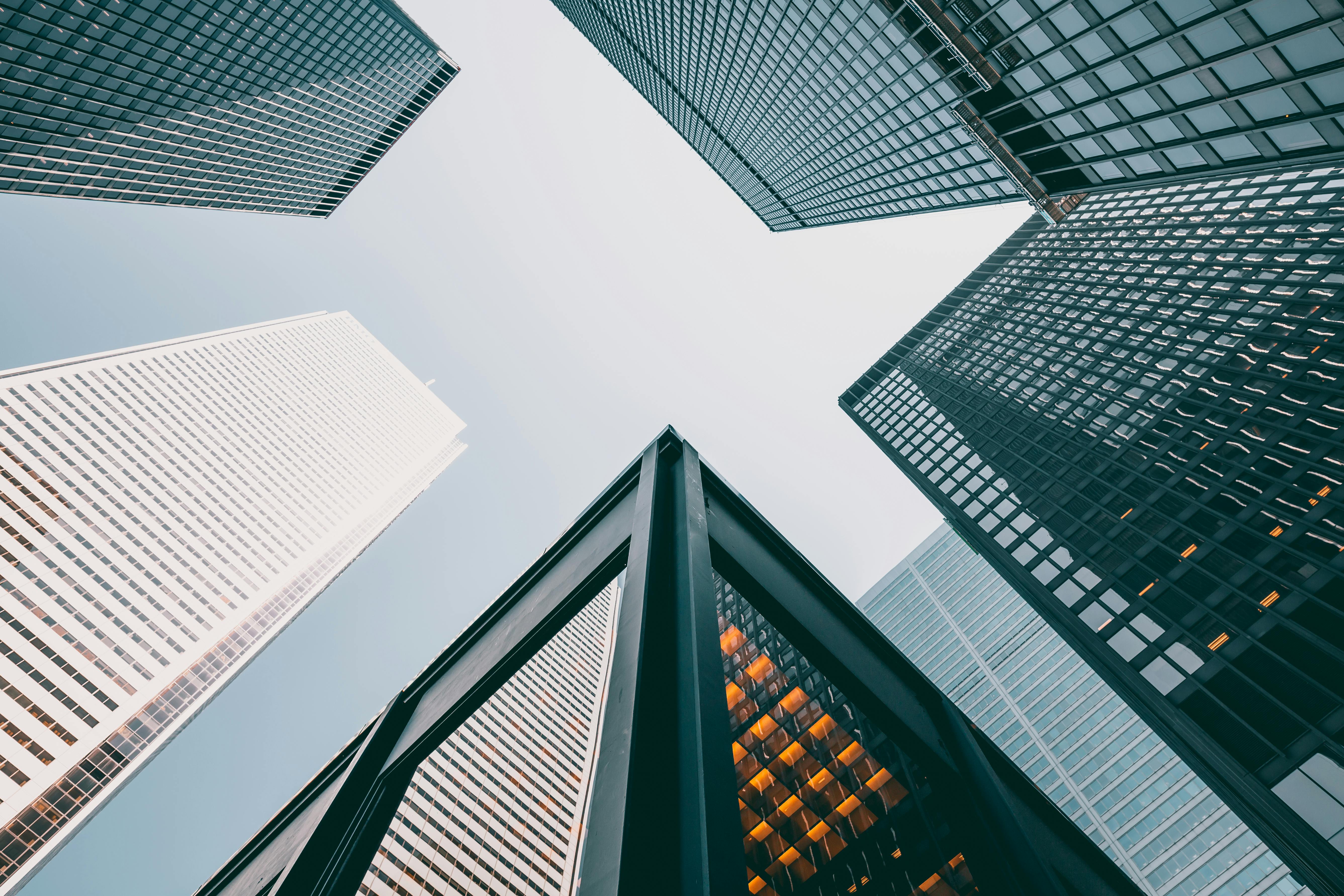 Looking up at skyscrapers