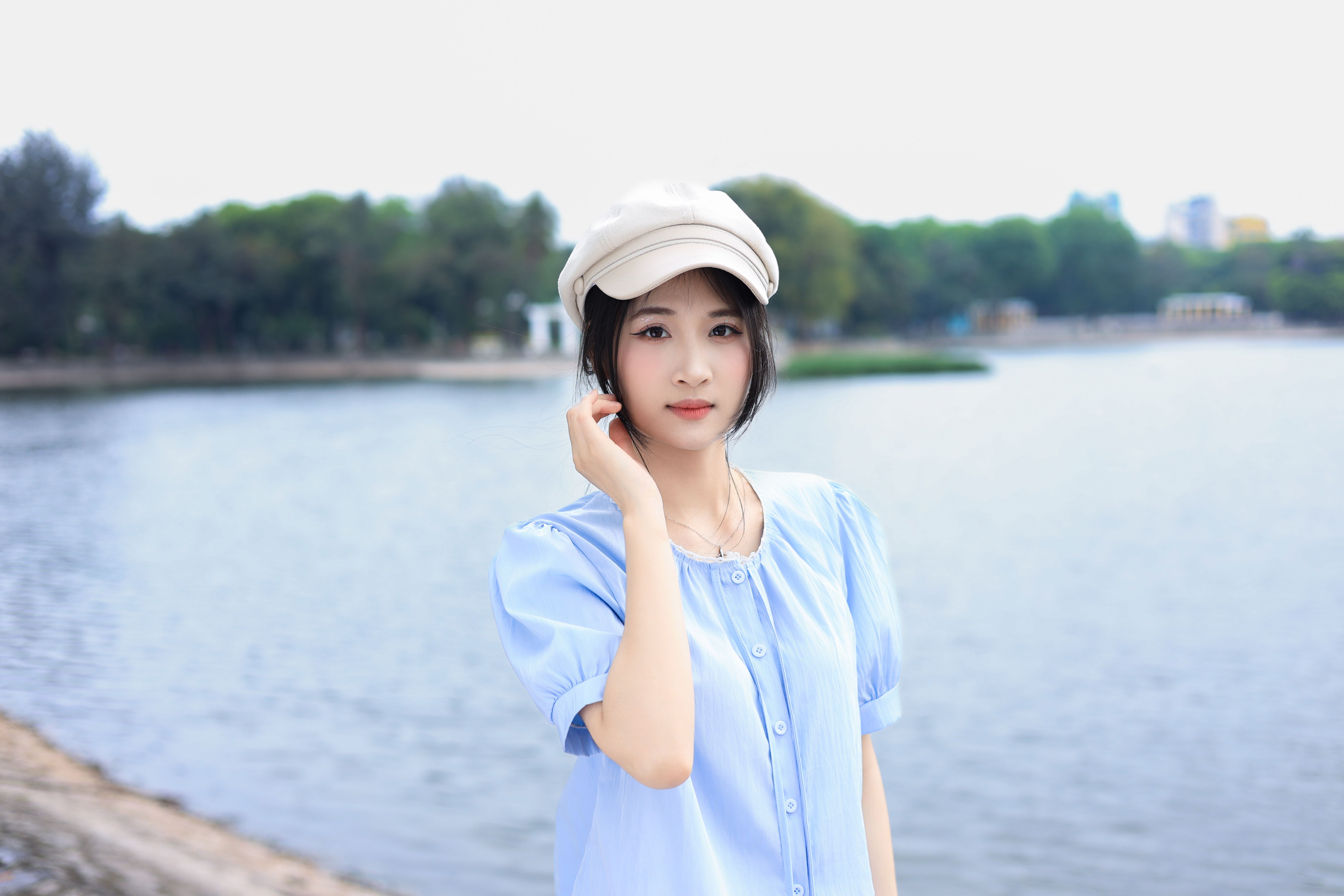 Young Woman in Vietnamese Park Setting · Free Stock Photo