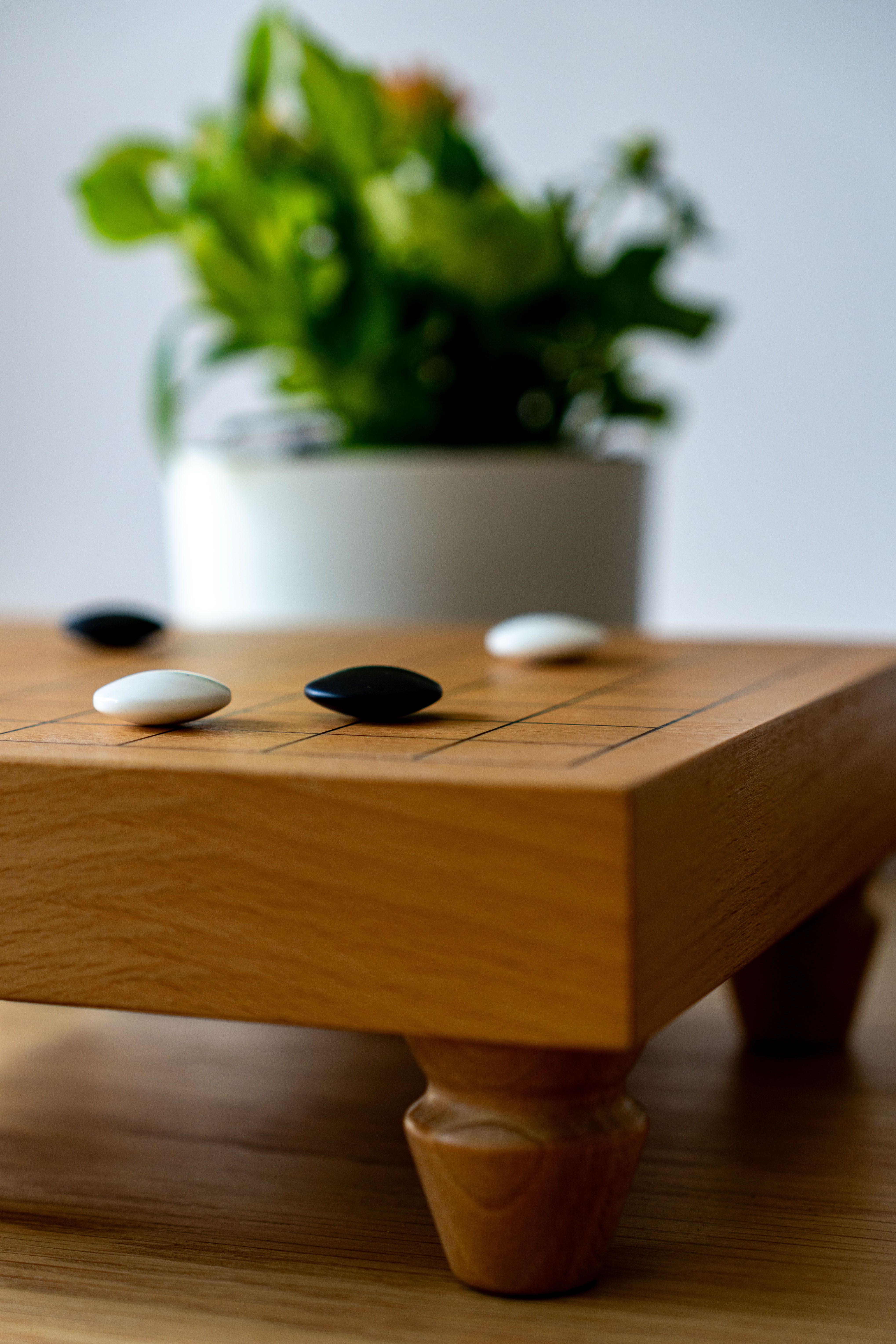 Elegant Wooden Goban with Go Stones