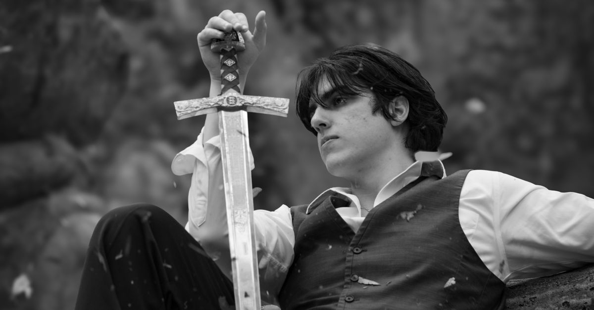 Free Graphics Editing Program Dramatic Black and White Portrait with Sword · Free Stock Photo