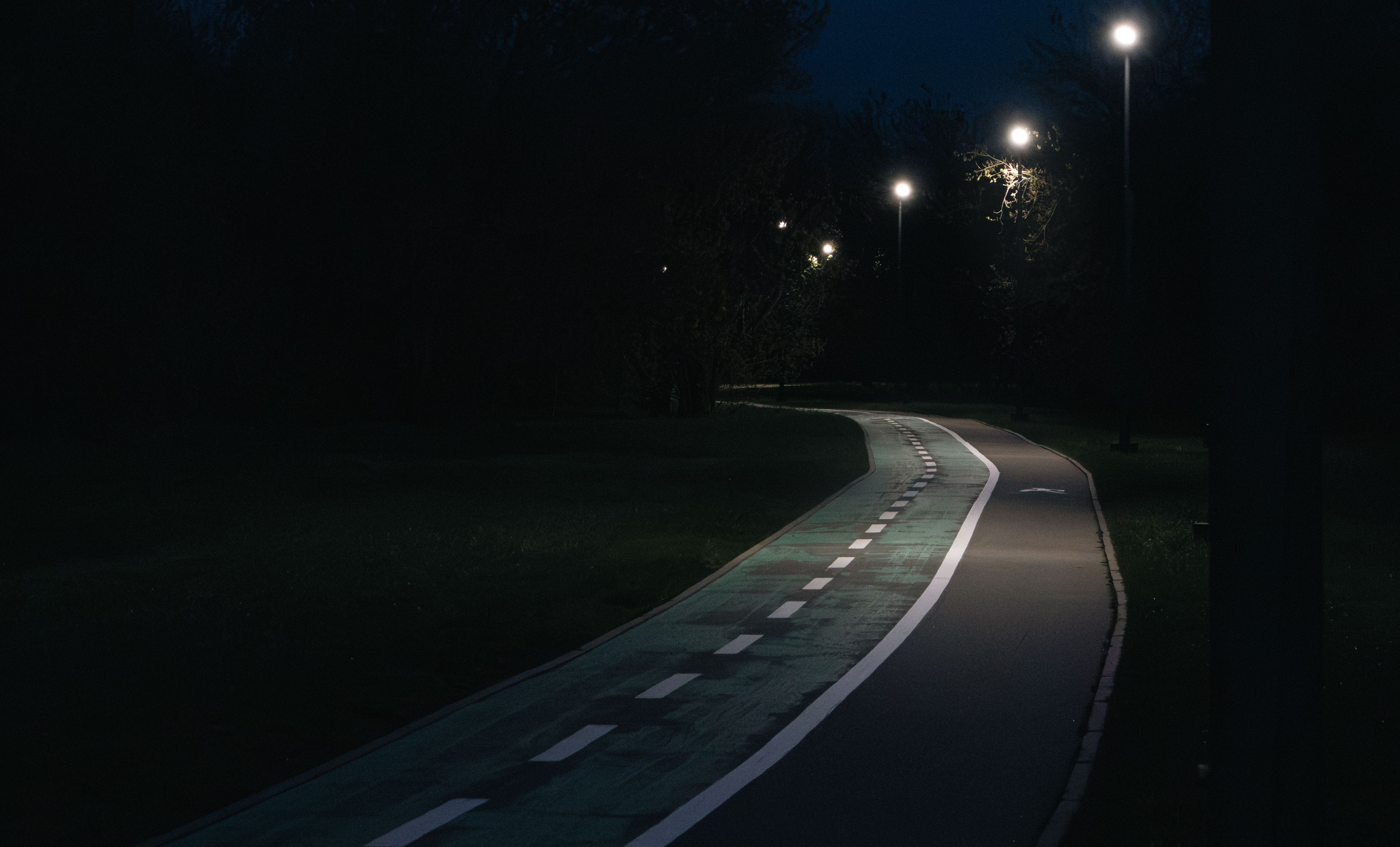 Lit perimeter walking path around Seonjeongneung royal tombs at night Gangnam