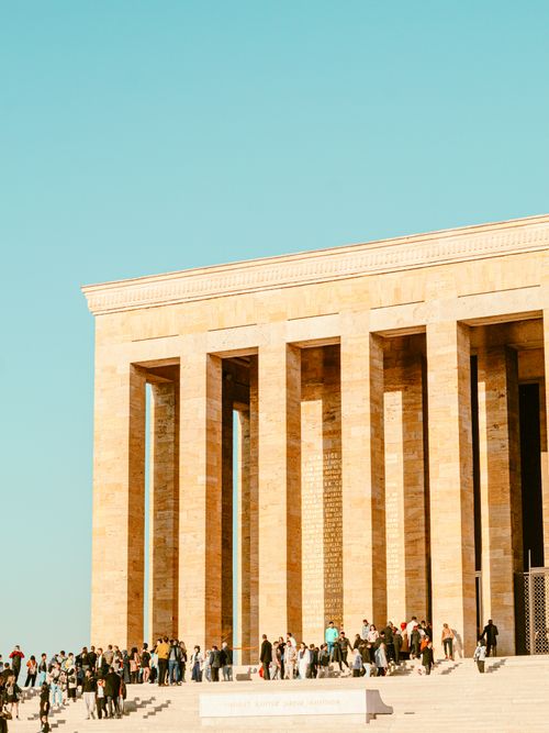 Free People gather at the iconic Anıtkabir monument in Ankara under a clear blue sky. Stock Photo