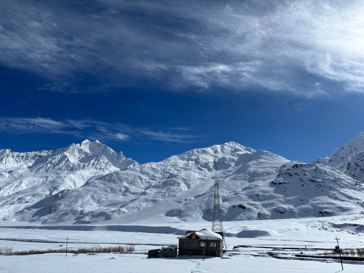 scenic view of snowy himalayas in zanskar valley with blue sky and cir