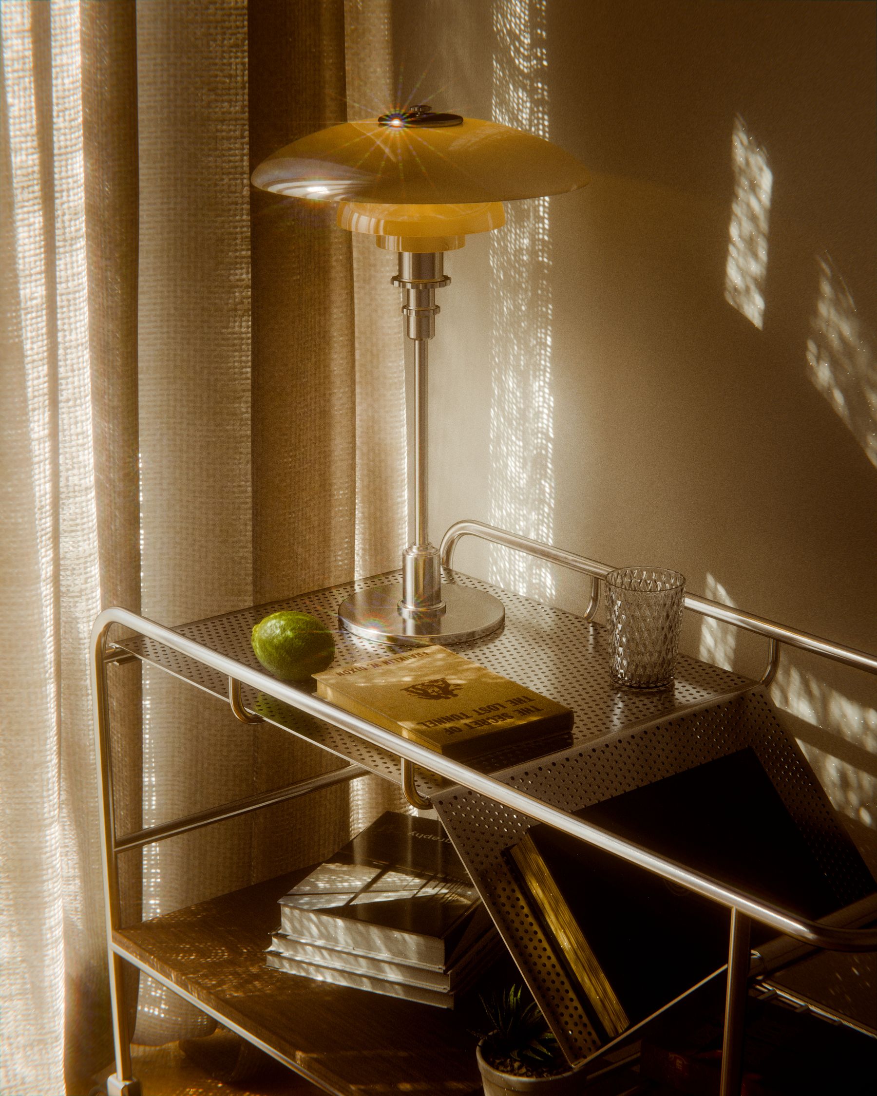 Warm glass-and-metal table lamp glowing beside stacked books and a small plant