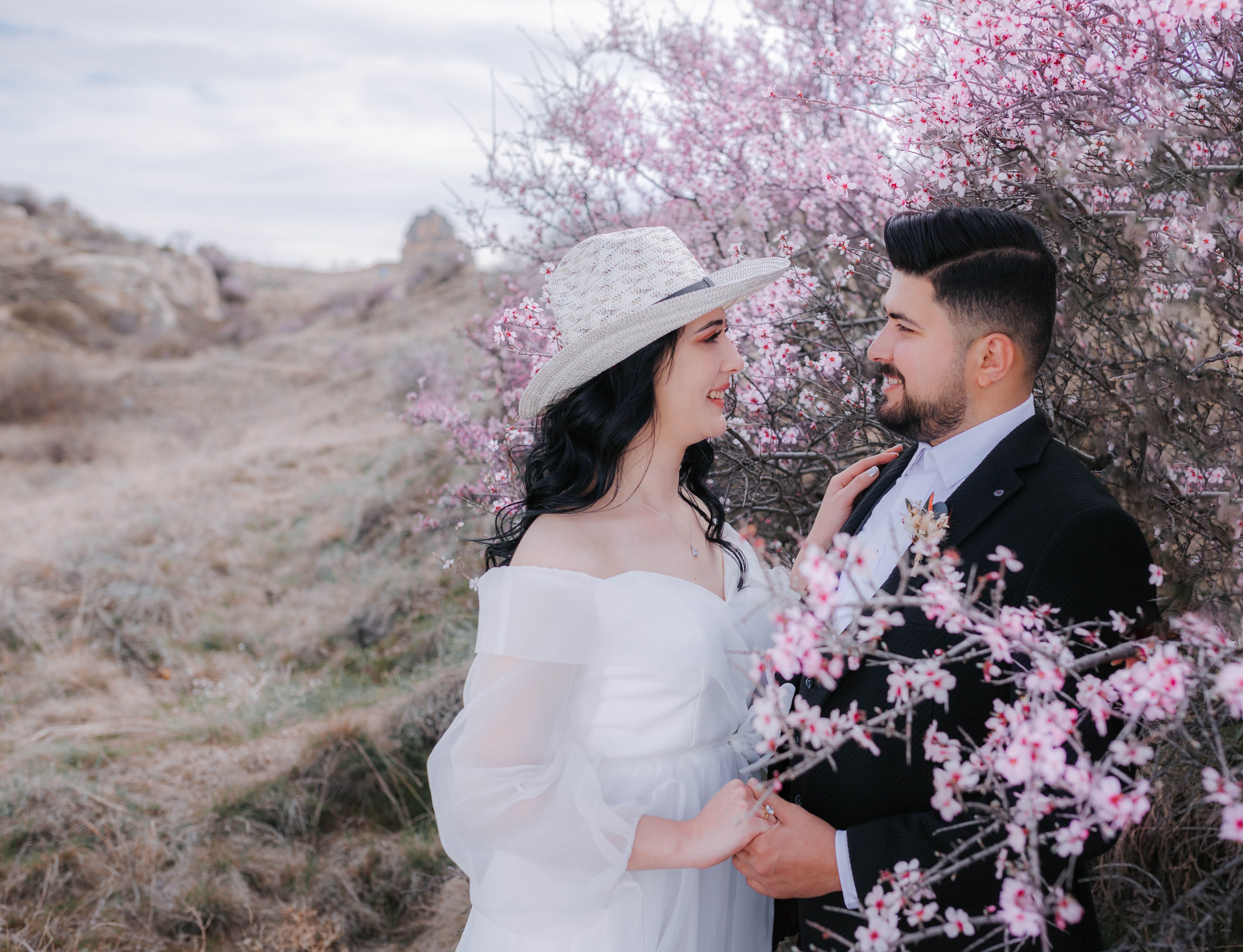 Romantic Couple in Spring Blooming Landscape · Free Stock Photo