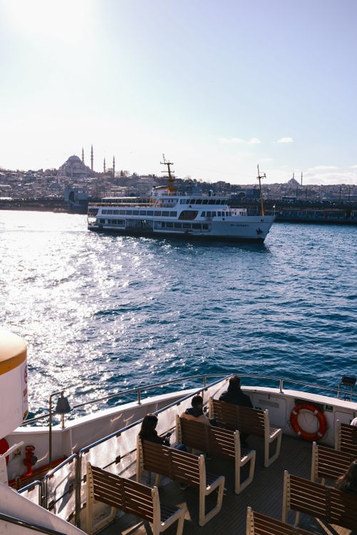 Free Ferry cruise on Istanbul's Bosphorus with city skyline. Scenic and relaxing travel experience. Stock Photo