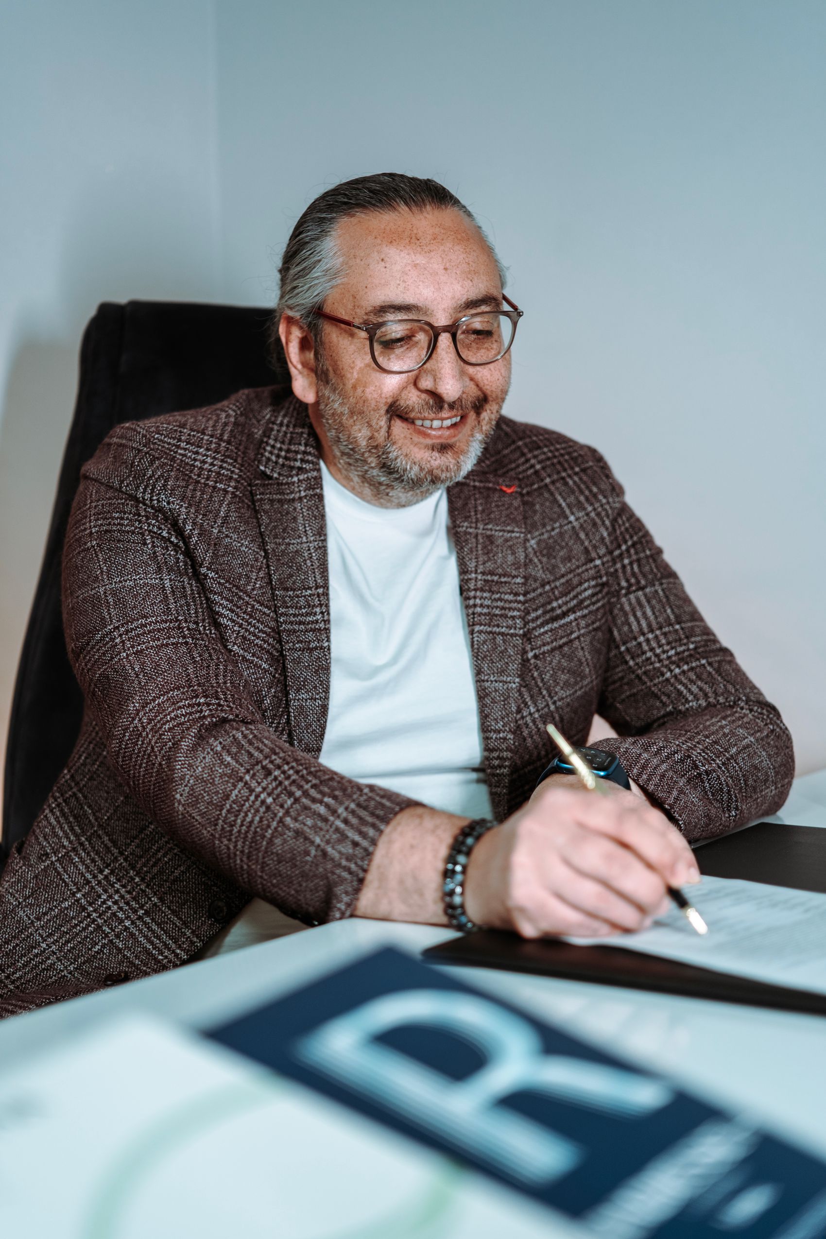 Business owner signing registration and business documents