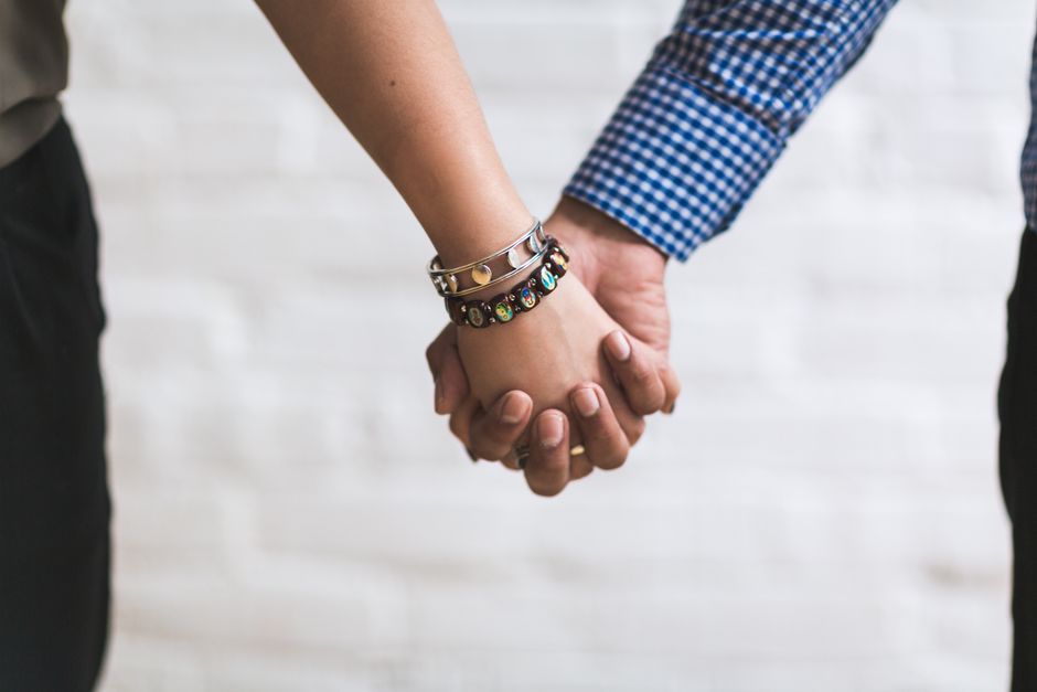 people holding hands together