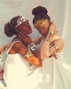 A Women Wearing Accessories while Eyes are Closed