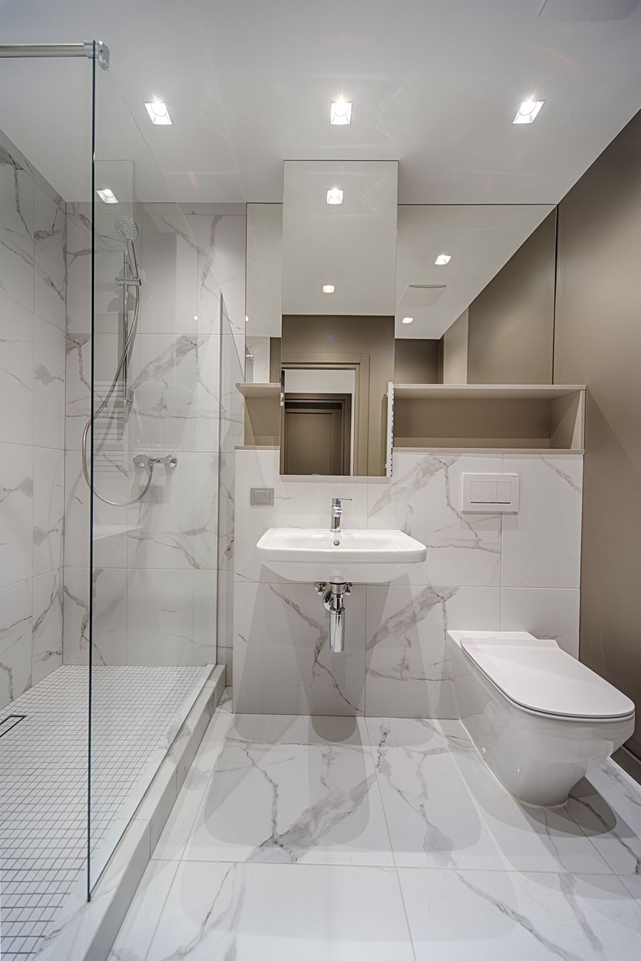 Marble-clad hotel bathroom
