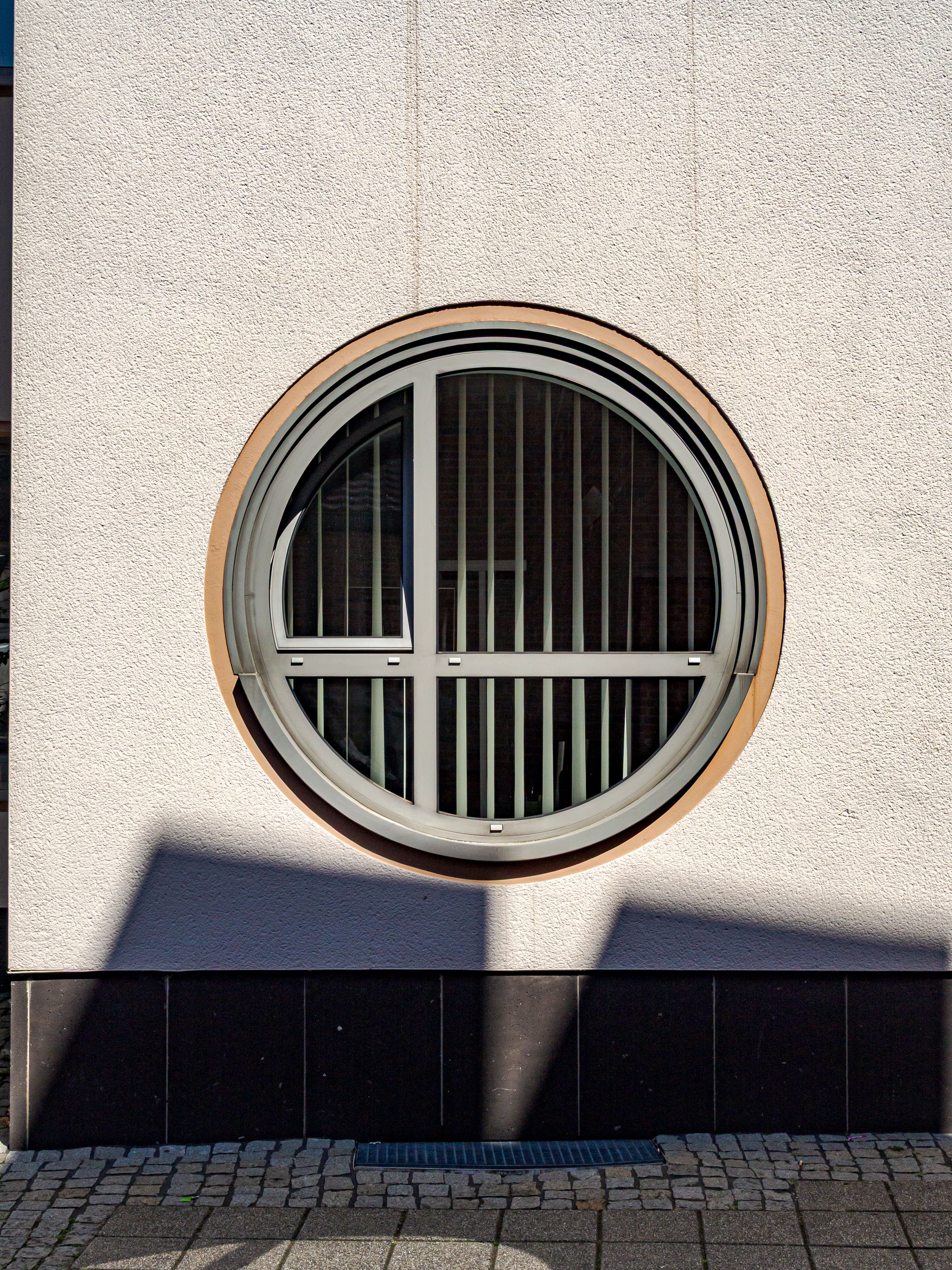Circular Window with Architectural Shadows in Coesfeld · Free Stock Photo