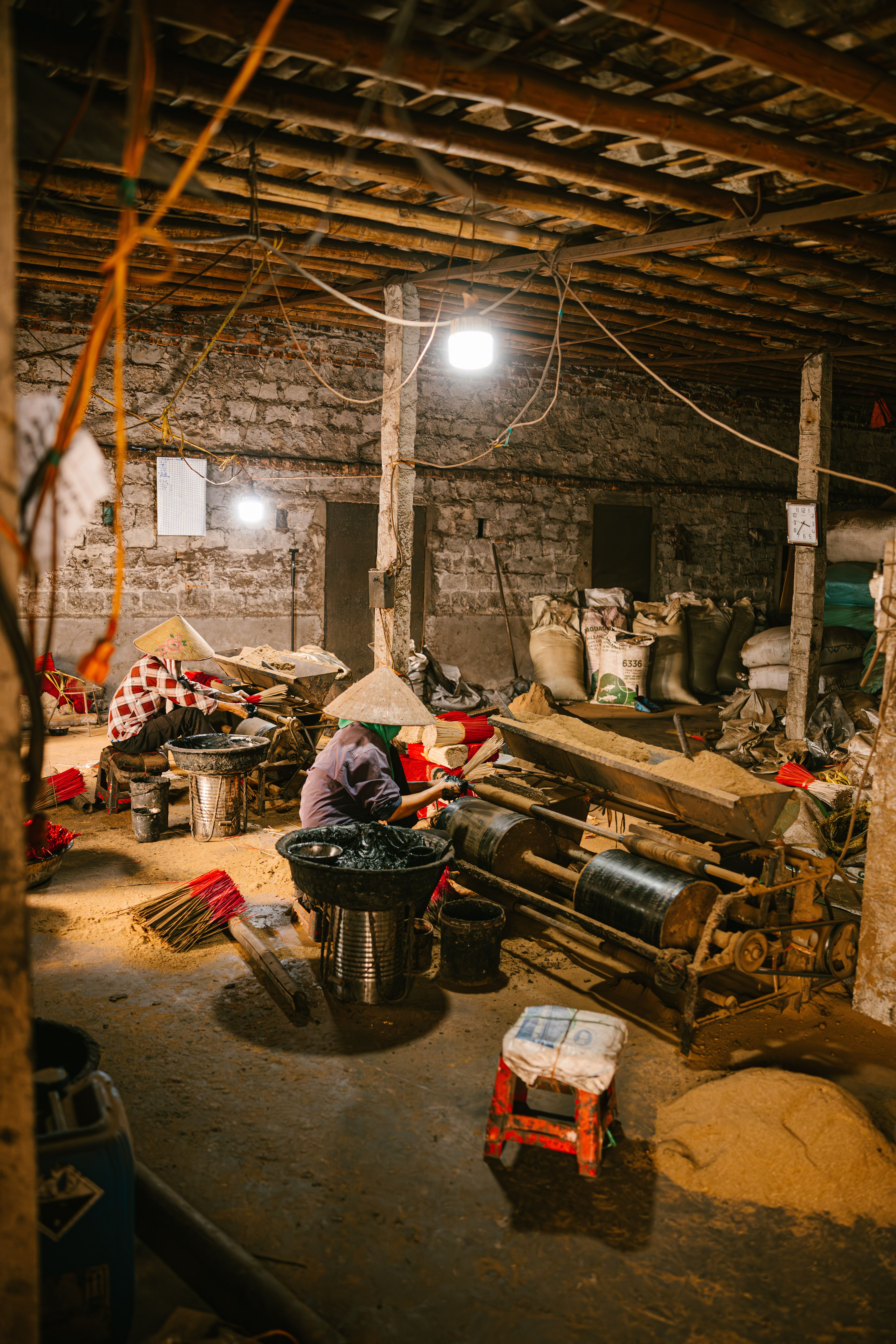 Laborers Working in Rustic Industrial Warehouse · Free Stock Photo