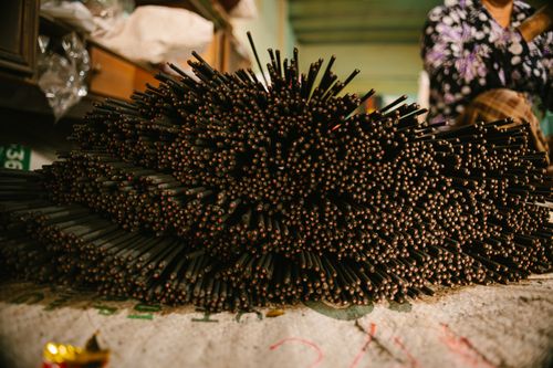 Free Pile of handcrafted incense sticks in a workshop, showcasing traditional manufacturing techniques. Stock Photo