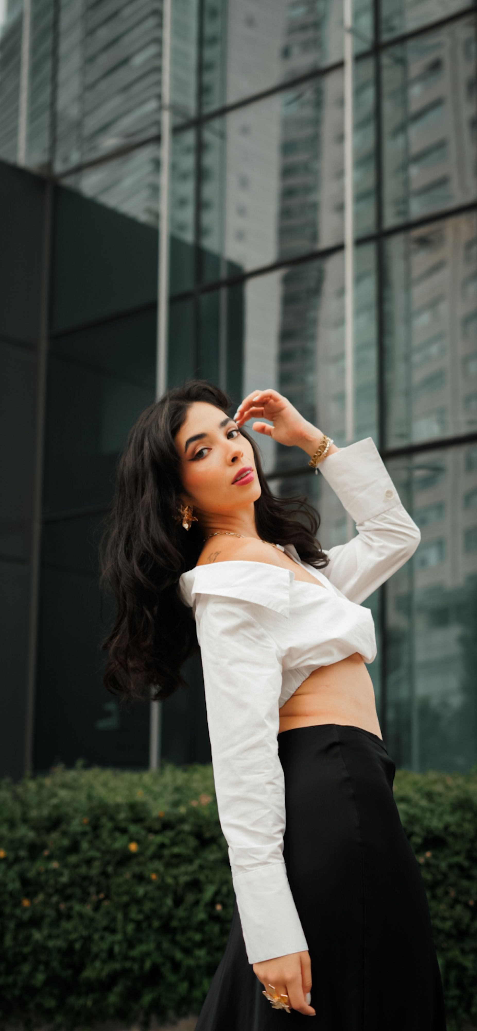 Elegant Woman Posing in Urban Setting