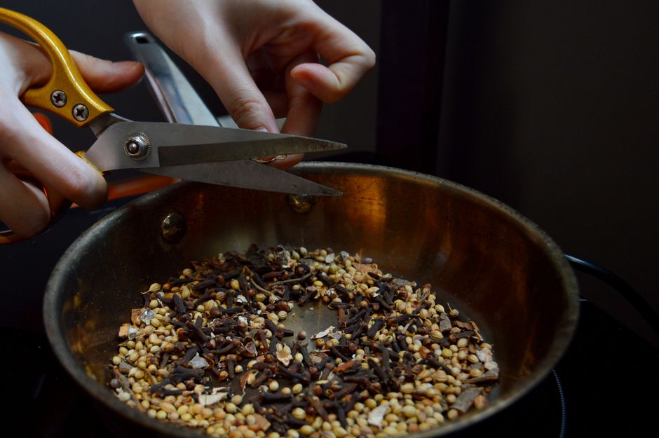 Spices toasting in a pan, steam rising. (Photo: Photo by Valeria Drozdova on Pexels)