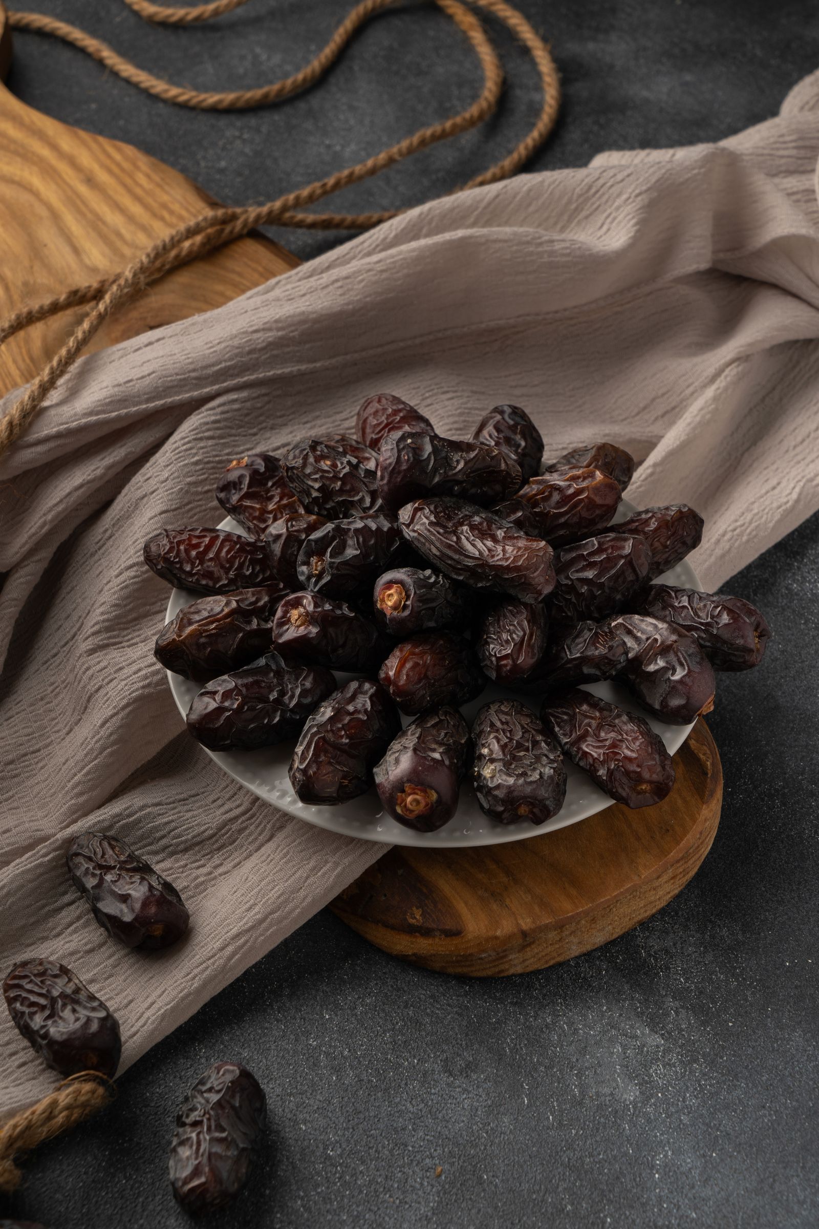 Medjool dates arranged on a plate.