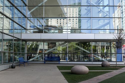 Free Exterior view of glass facade at Denver Convention Center showcasing modern architectural style. Stock Photo