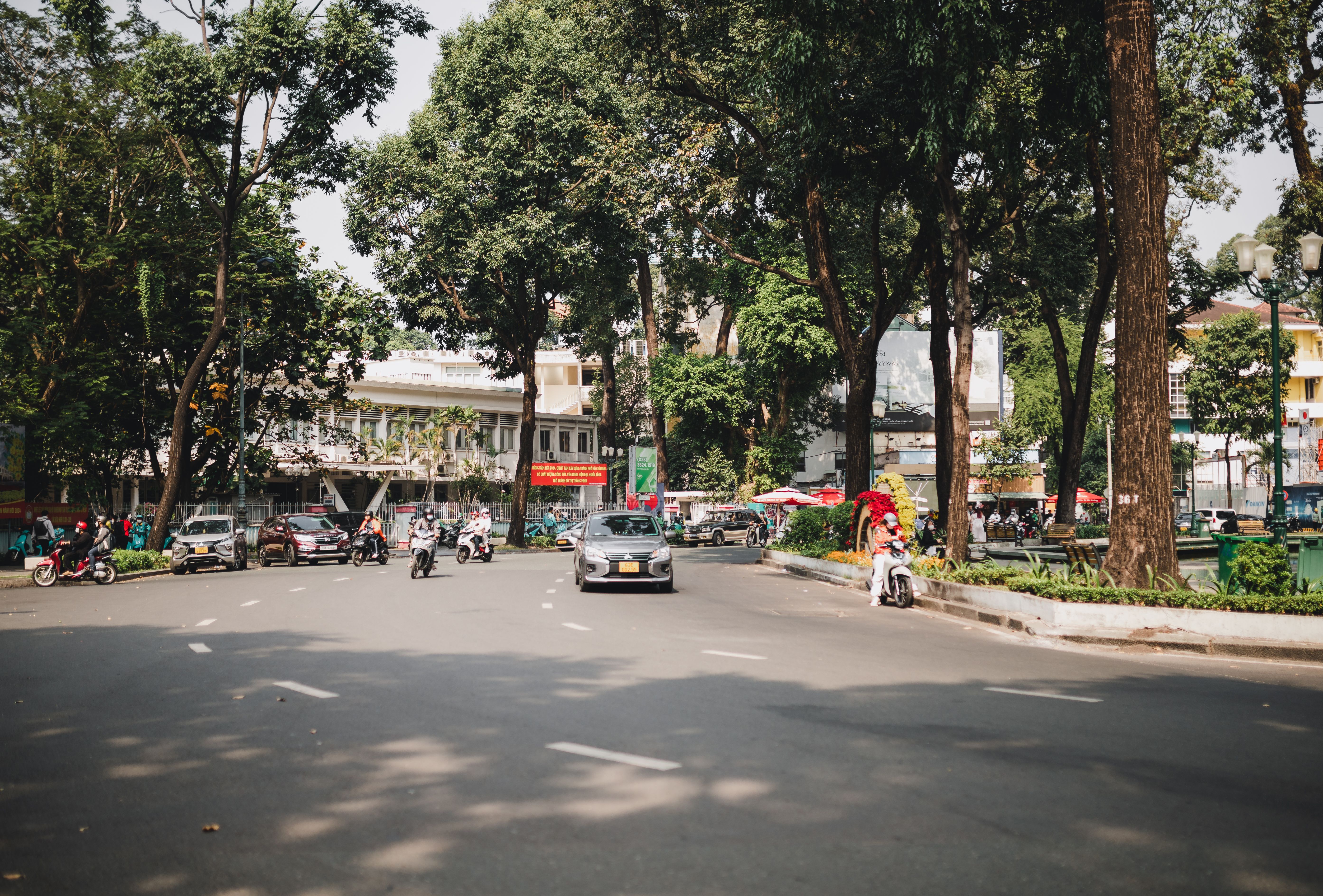 A Grab motorbike driver in Ho Chi Minh City, Vietnam, waiting for a passenger