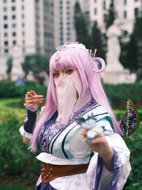 Free A captivating portrait of a cosplayer in vibrant costume outdoors in Vietnam. Stock Photo