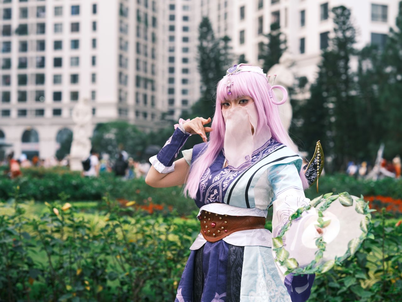 a captivating cosplay character posing in a vibrant urban garden setti