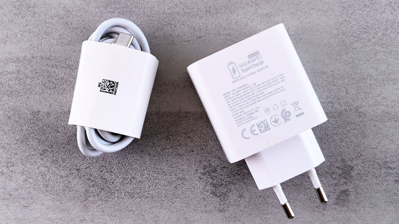 sleek hardwired wall charger mounted securely on the wall of a neat residential garage