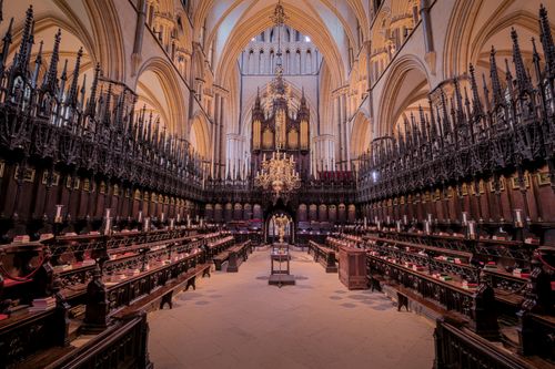 Free Explore the stunning Gothic architecture and rich history inside Lincoln Cathedral, England. Stock Photo