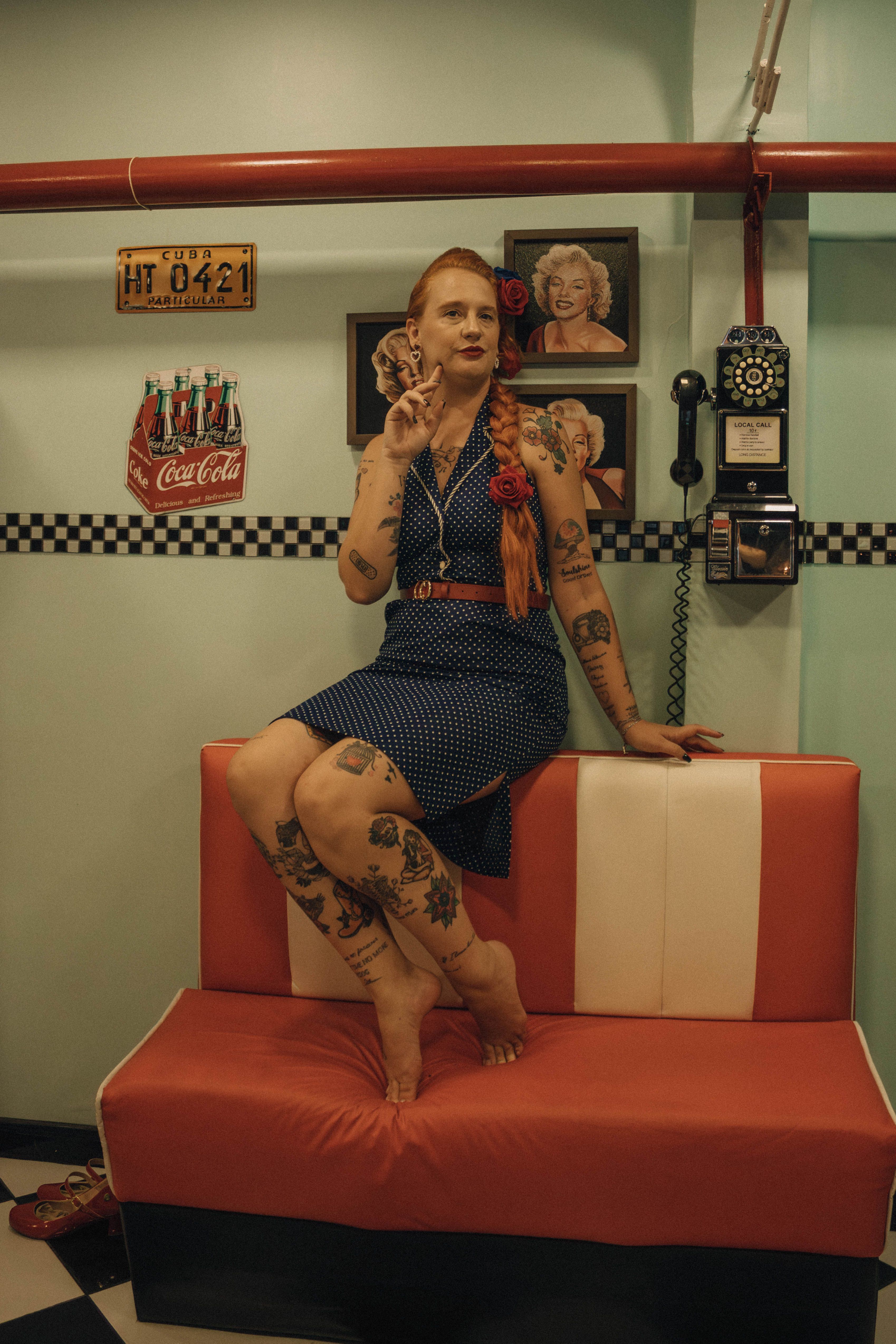 vintage diner style with tattooed woman