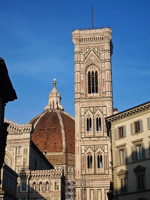 Free View of Florence Cathedral and Giotto's Campanile on a sunny day capturing architectural details. Stock Photo