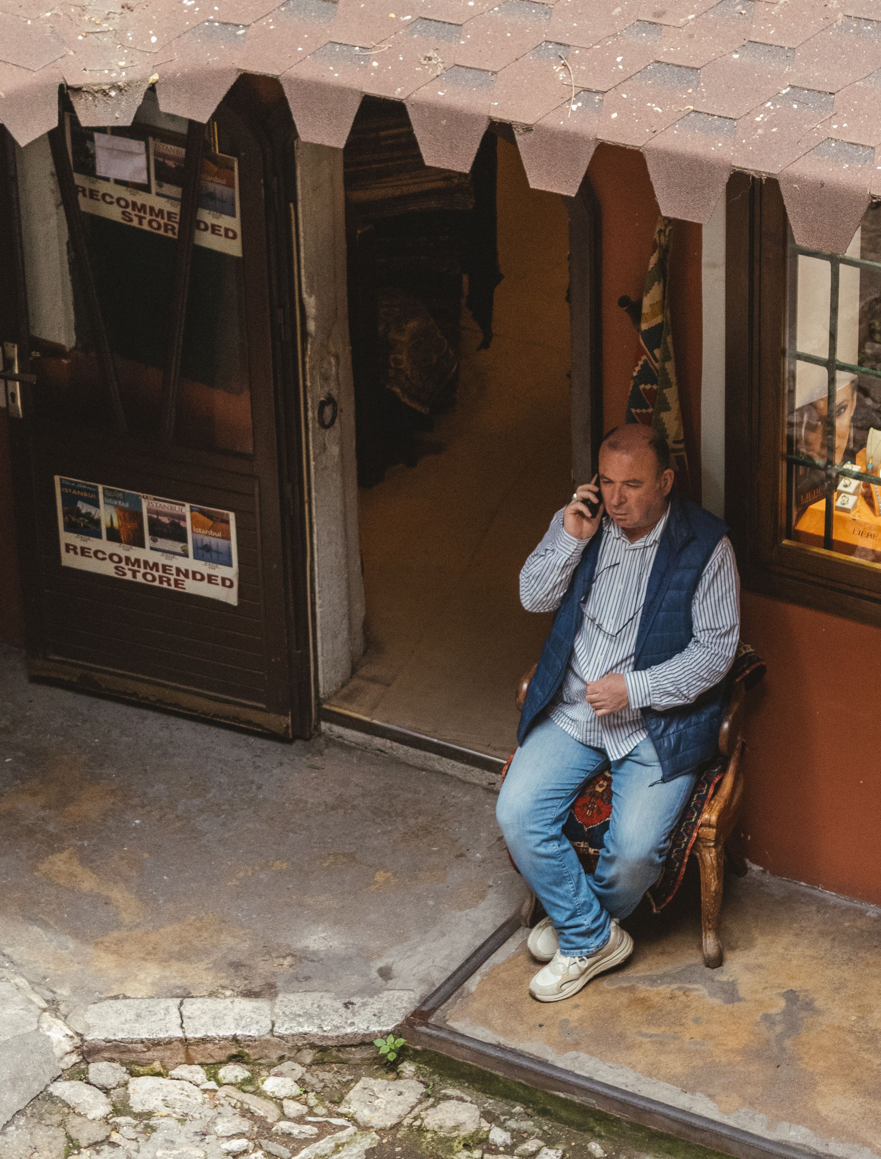Local business owner reviewing a local SEO audit outside a shop