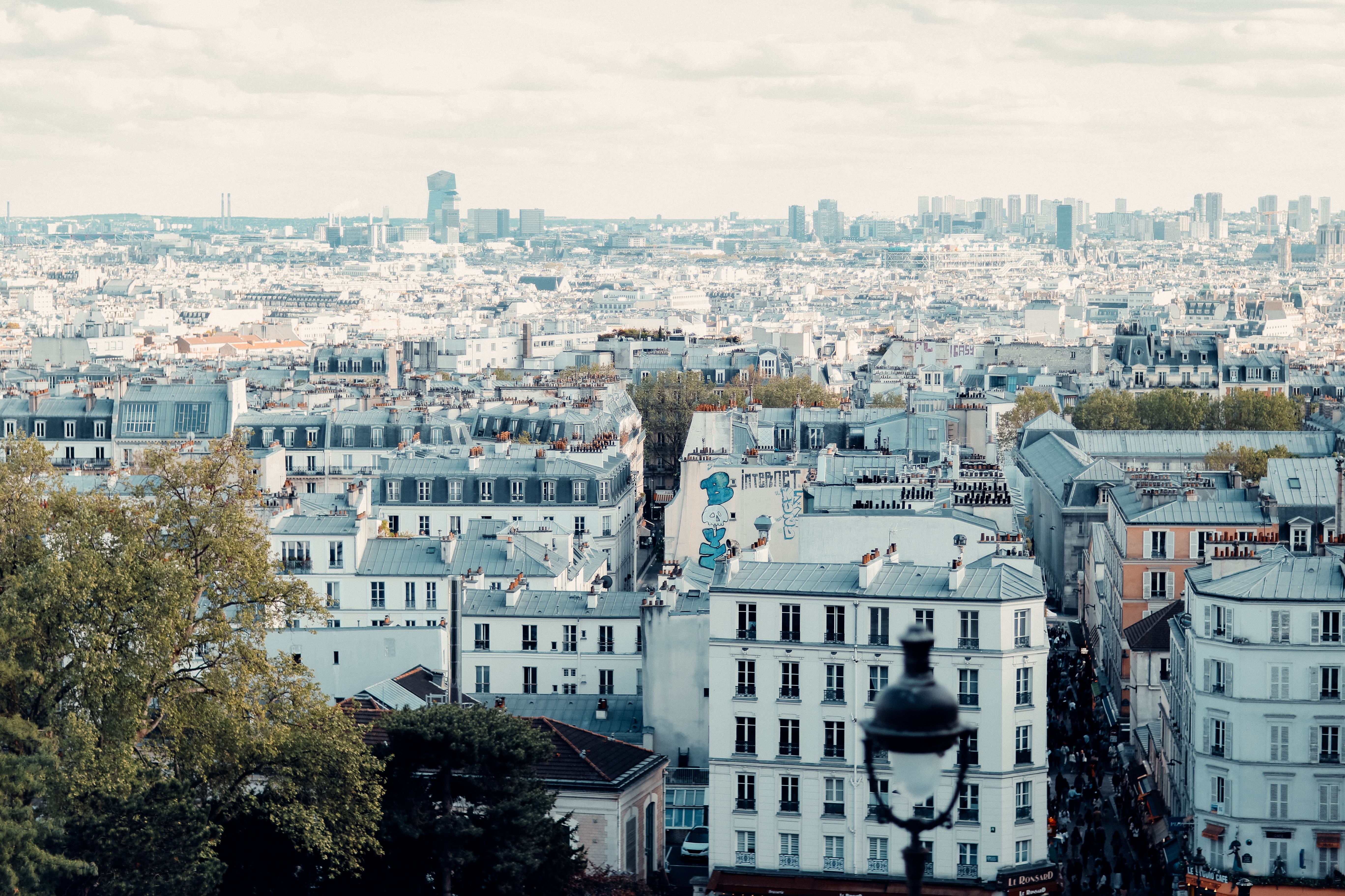 Scenic Parisian Rooftops with Cityscape View · Free Stock Photo