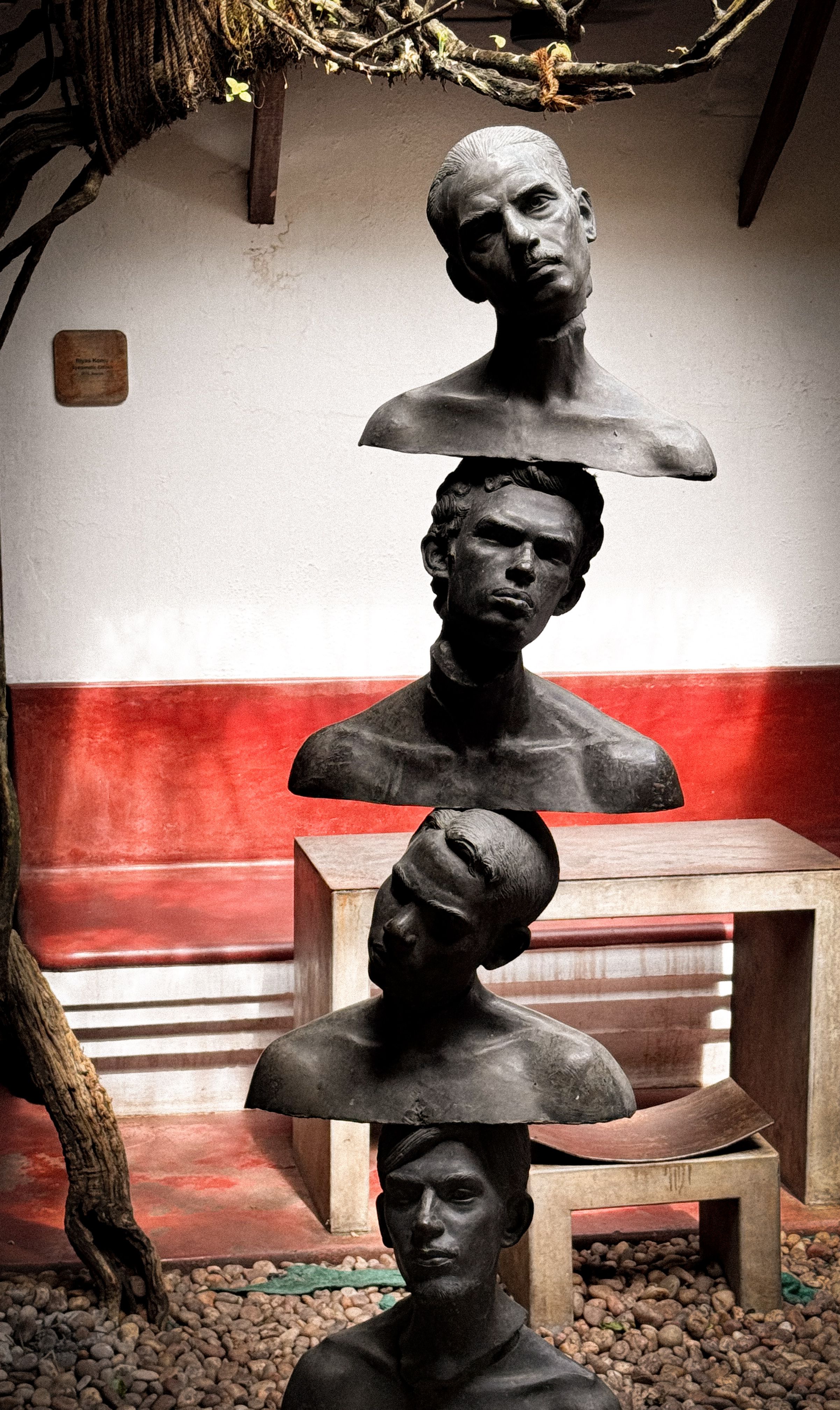 Innovative sculpture installation in a courtyard with a modern artistic style.