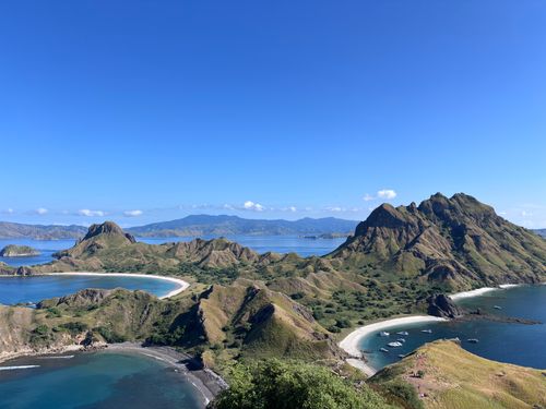 Free A stunning aerial view of Padar Island's rugged coastline and turquoise waters in Indonesia. Stock Photo