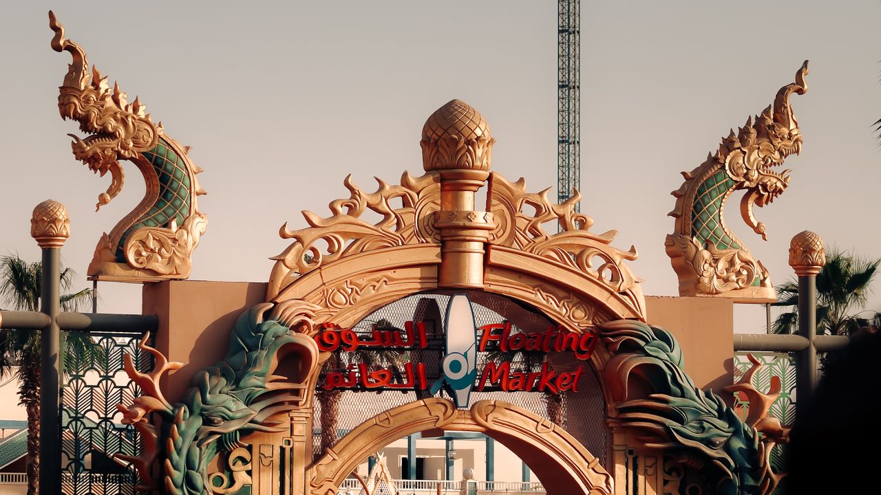 The ornate, dragon-topped entrance to the Floating Market at Global Village
