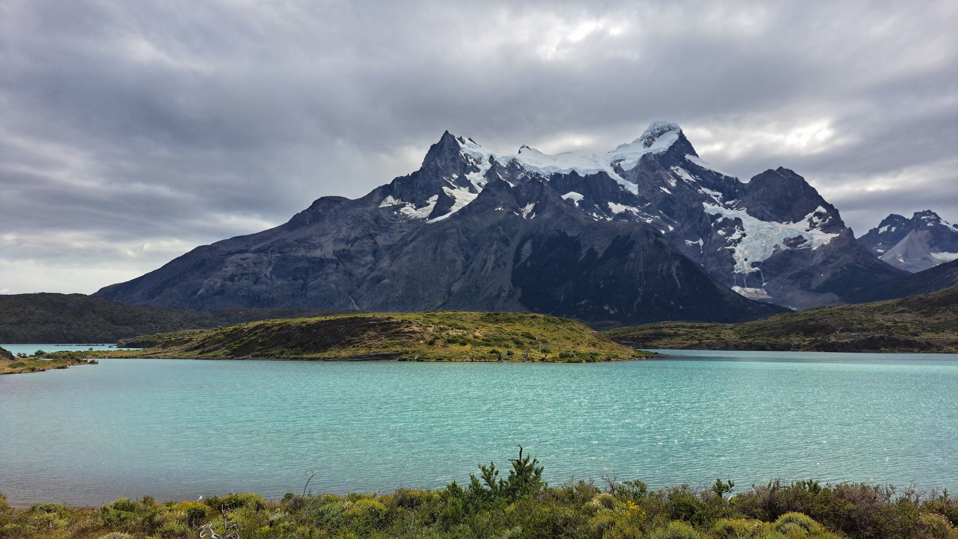 Andes mountains and turquoise lake in Torres del Paine, Patagonia