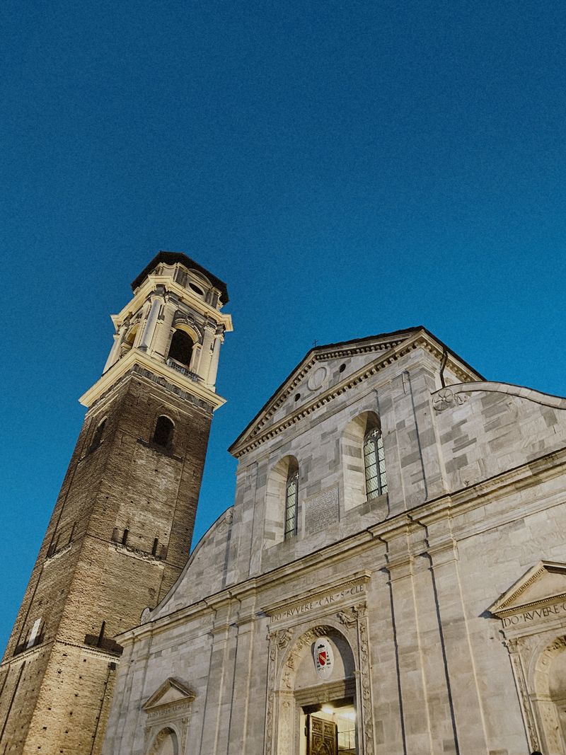 Turin Cathedral and bell tower against blue sky