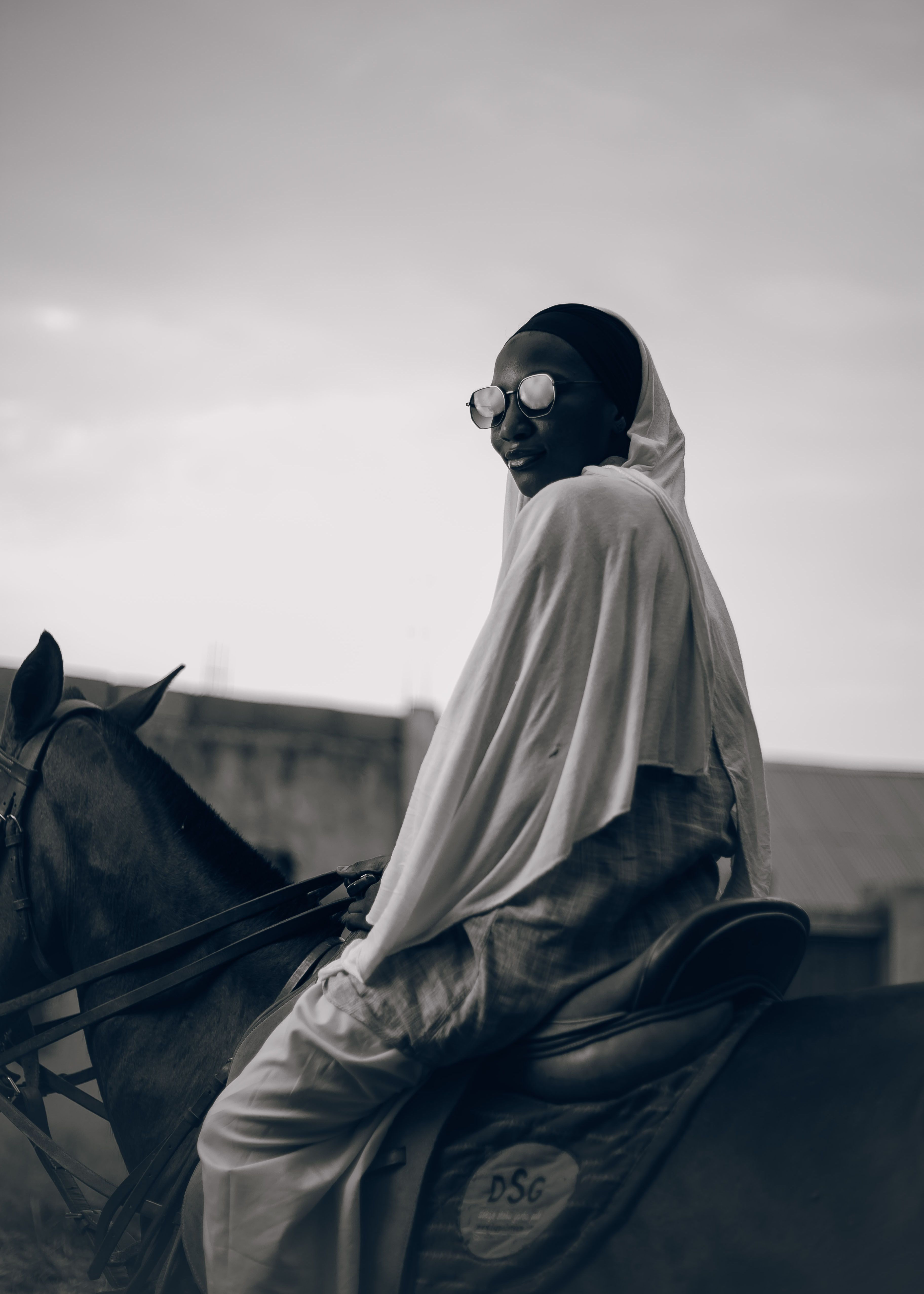 African Woman Riding Horse in Nigerian Landscape · Free Stock Photo