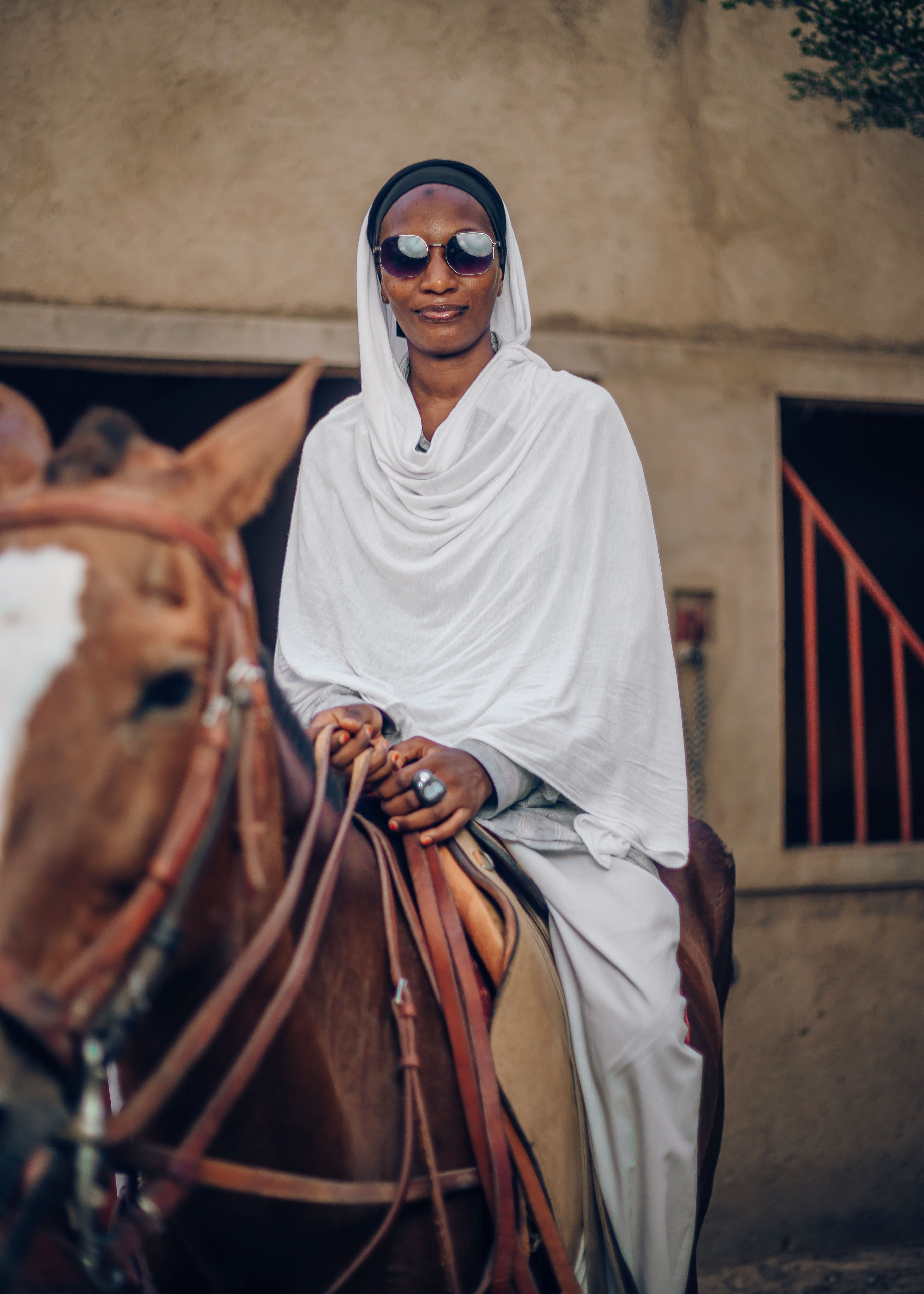 African Woman Riding Horse in Nigerian Village · Free Stock Photo
