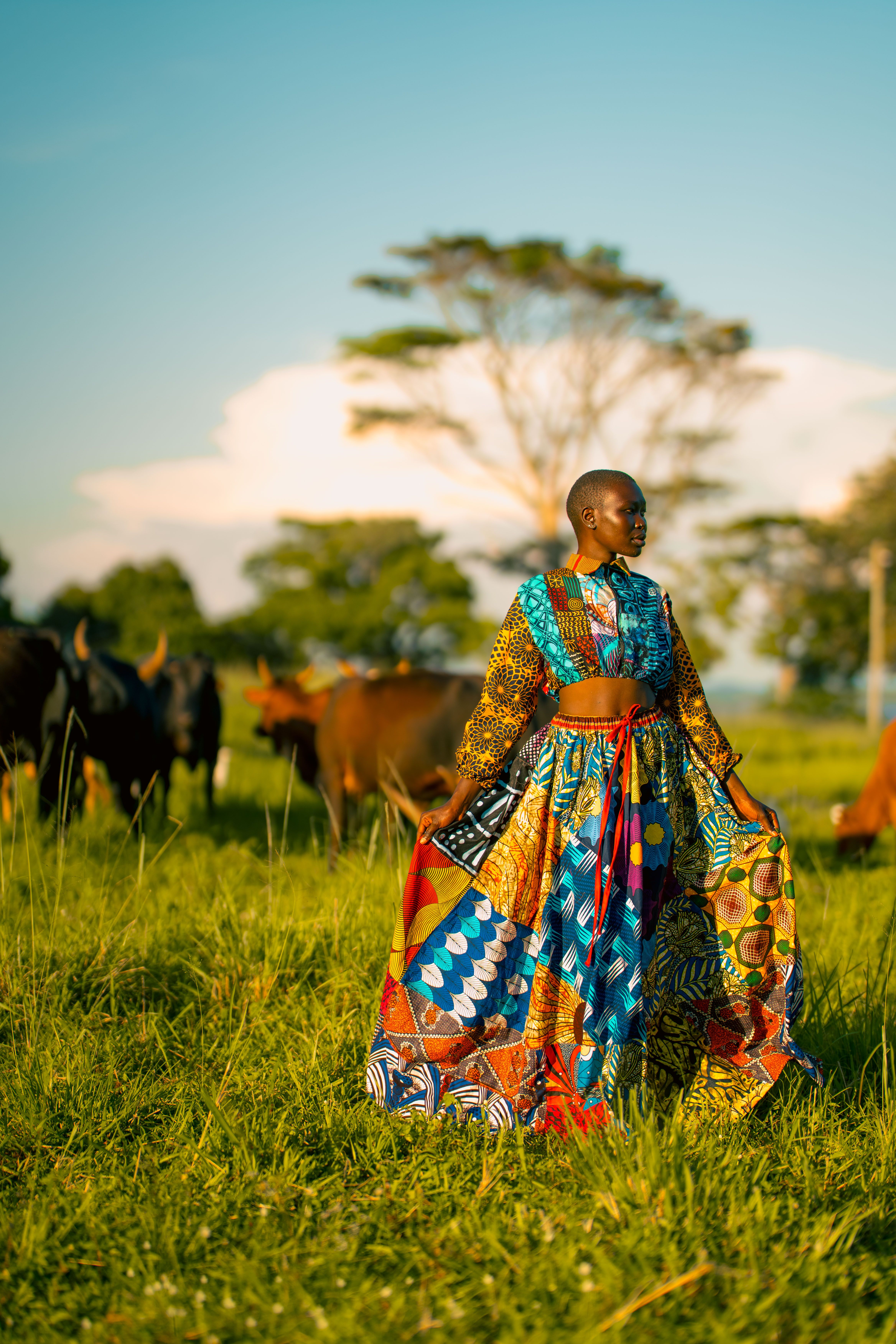 uganda ladies dresses Woman in Colorful African Dress in Ugandan Pasture · Free Stock Photo damen