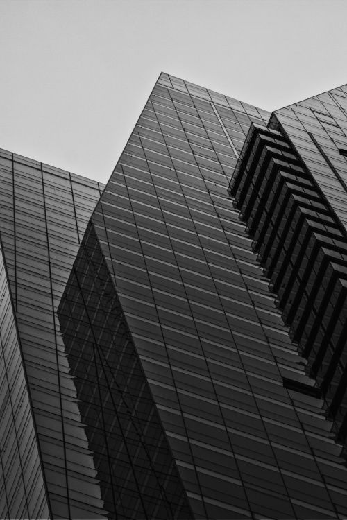 Free Monochrome view of sleek skyscrapers in Montreal, highlighting modern architectural lines. Stock Photo
