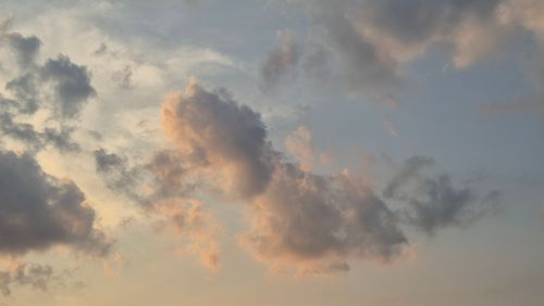Free A tranquil evening sky with vibrant clouds illuminated by the setting sun in Gia Lai, Vietnam. Stock Photo