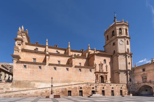 Free The historic Lorca Castle in Spain under a clear blue sky, showcasing its impressive architecture. Stock Photo
