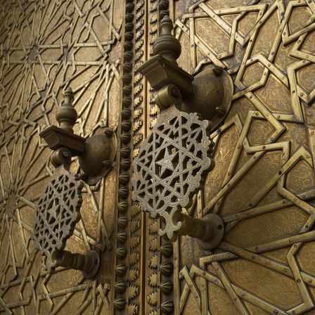 Close-up of ornate cast brass hardware — photo by Cornelis Johannes (Kees) van Leeuwen on Pexels