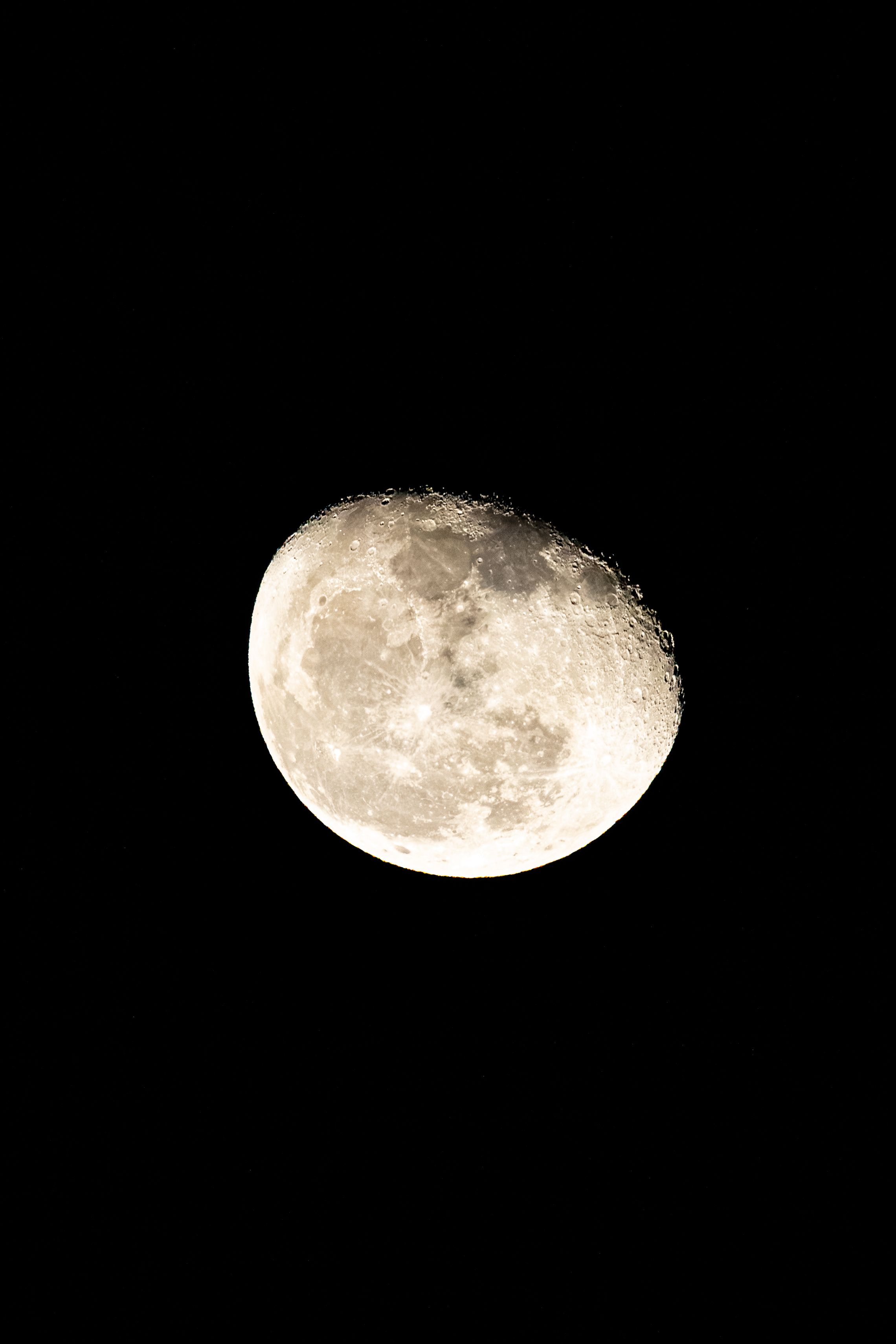 High-resolution image of the waxing gibbous moon against a dark sky, capturing lunar details.