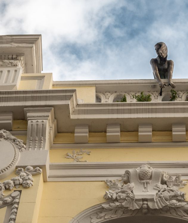 Historic Architecture with Bronze Statue Detail · Free Stock Photo