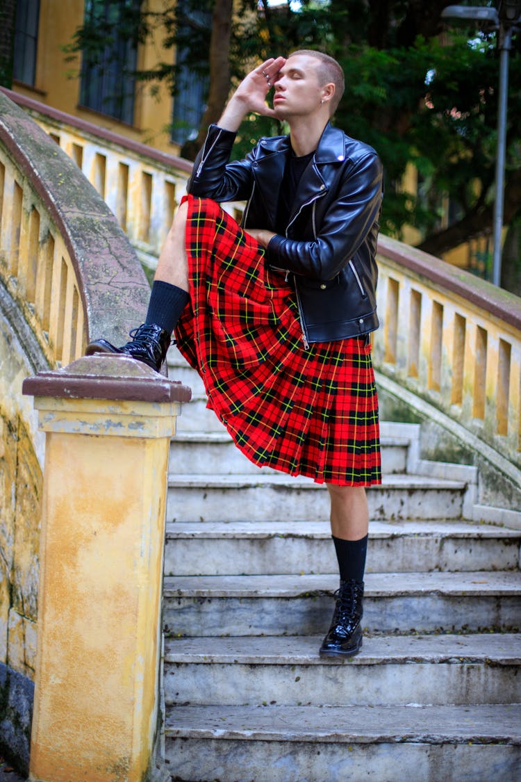 Brutal Male Model In Kilt On Stairway