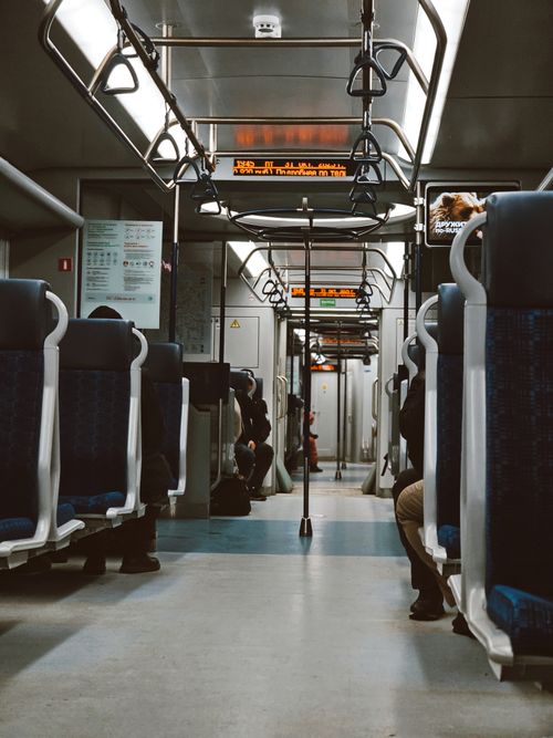 Free Interior view of the Moscow Metro train during a quiet day with sparse passengers. Stock Photo