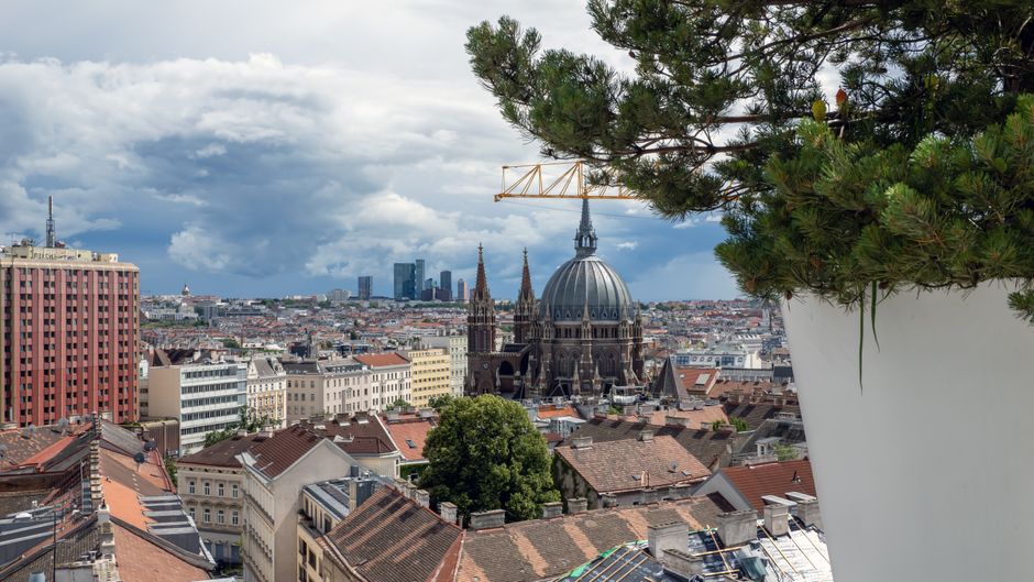 Stunning aerial view of Vienna showcasing Votive Church and the city's historic architecture.