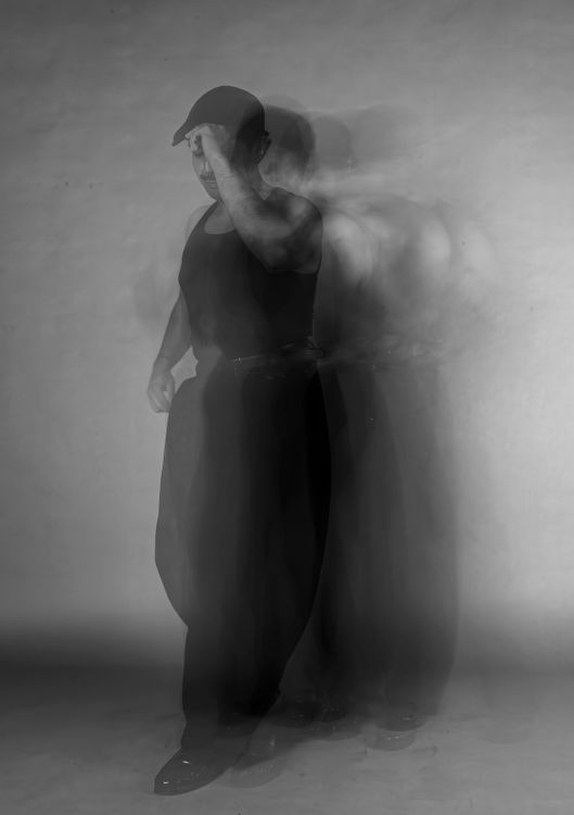 Dynamic Motion Blur of a Man in Black and White · Free Stock Photo