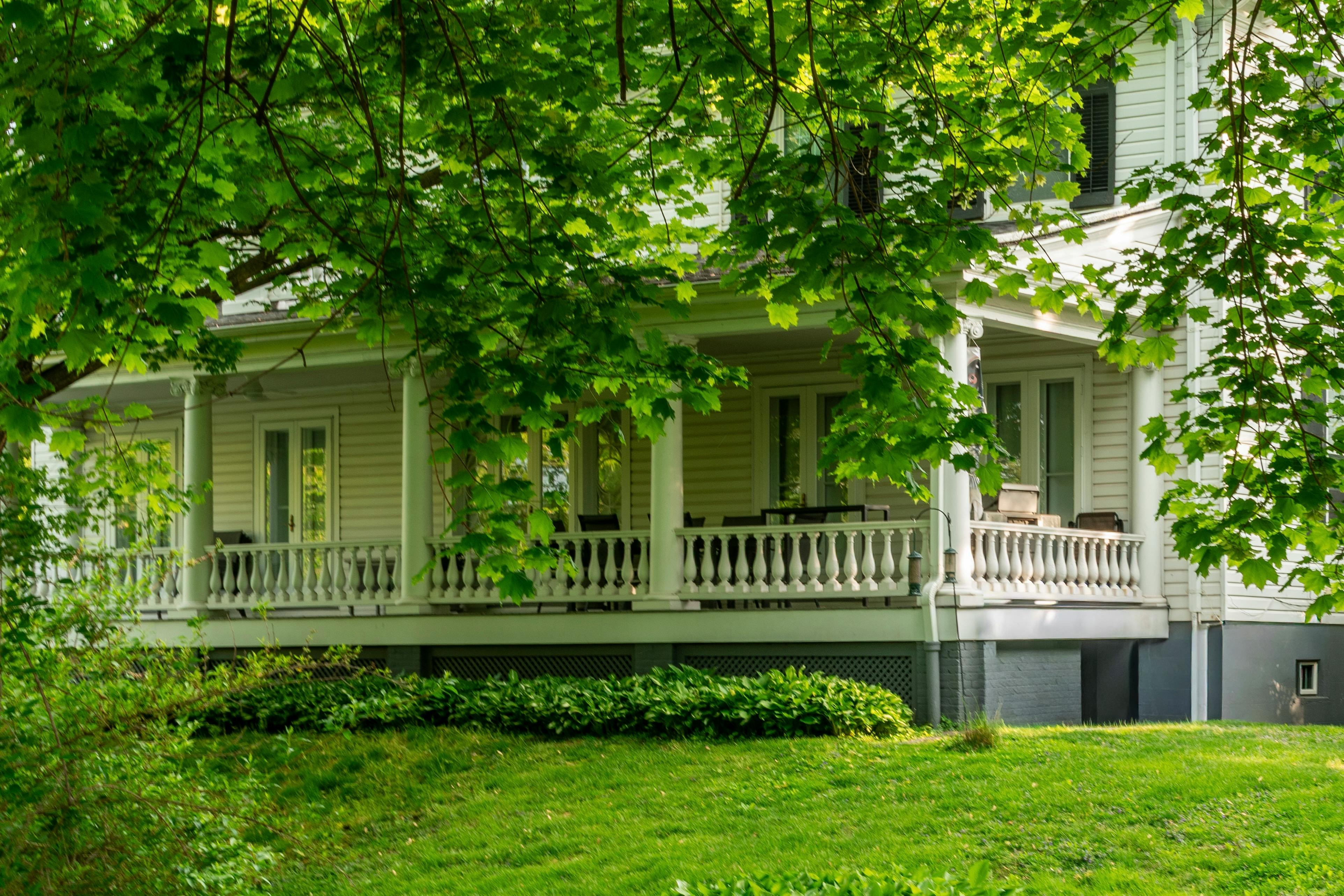 suburban home exterior with porch front yard